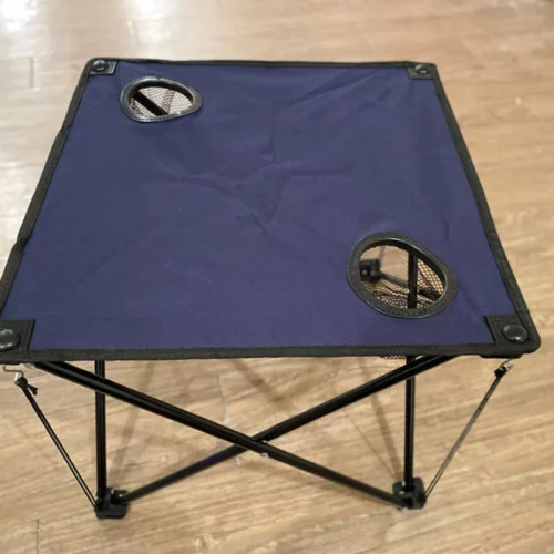 Table pliante compacte pour sable