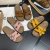 Mules double boucle en suédine