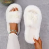 Chaussons femme en peluche douce avec semelle épaisse et nœud décoratif