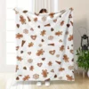 Plaid de Noël tricoté en polyester à motif pain d'épice et cannelle – 1 pièce