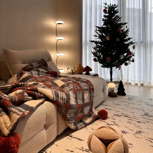 Plaid de Noël doux à carreaux rouges avec pompons – ambiance chaleureuse garantie