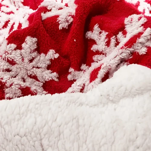 Plaid polaire de Noël rouge avec flocons – couverture douce et festive