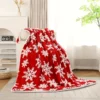 Plaid polaire de Noël rouge avec flocons – couverture douce et festive