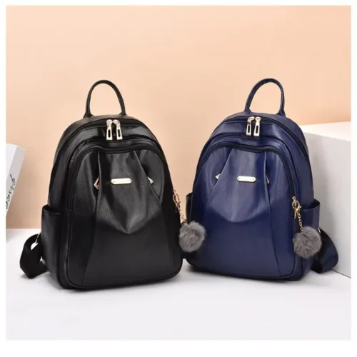 Sac à dos femme léger et élégant – polyester résistant avec pompon déco