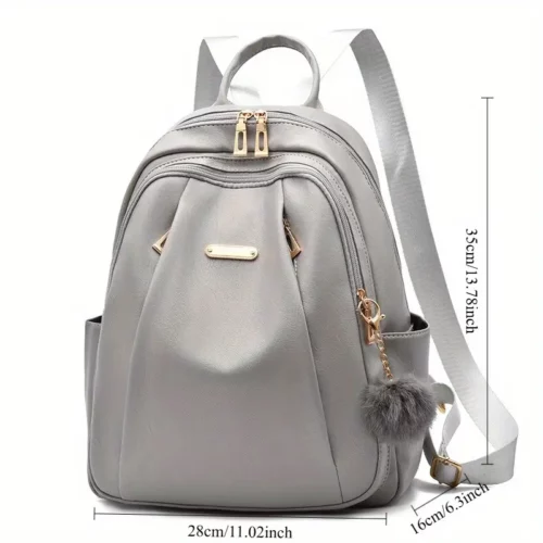 Sac à dos femme léger et élégant – polyester résistant avec pompon déco