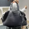 Sac week-end femme en nylon imperméable noir avec bandoulière amovible