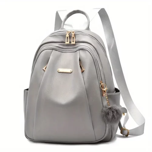 Sac à dos femme léger et élégant – polyester résistant avec pompon déco