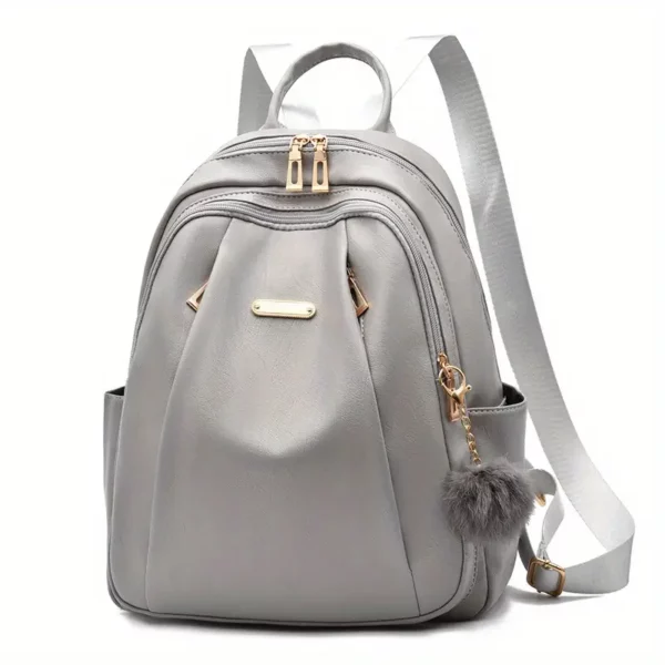 Sac à dos femme léger et élégant – polyester résistant avec pompon déco